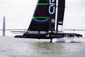 2013 America's Cup Sailing Boats "Fly" Over Water