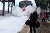 Amtrak Train Showers Commuters With Snow