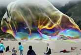 Giant Bubbles on the Beach