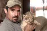 Lioness Trusts Man With Cubs