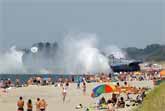 Russian Hovercraft Lands on Crowded Beach