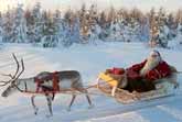 Santa Claus And Reindeer On The Road In Finland