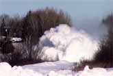 Train Dashes Through The Snow In Canada