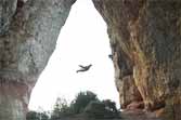 Wingsuit Flying Through A Narrow Cave